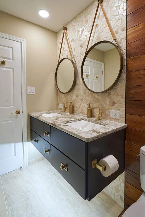 Dark floating vanity with double hanging mirrors