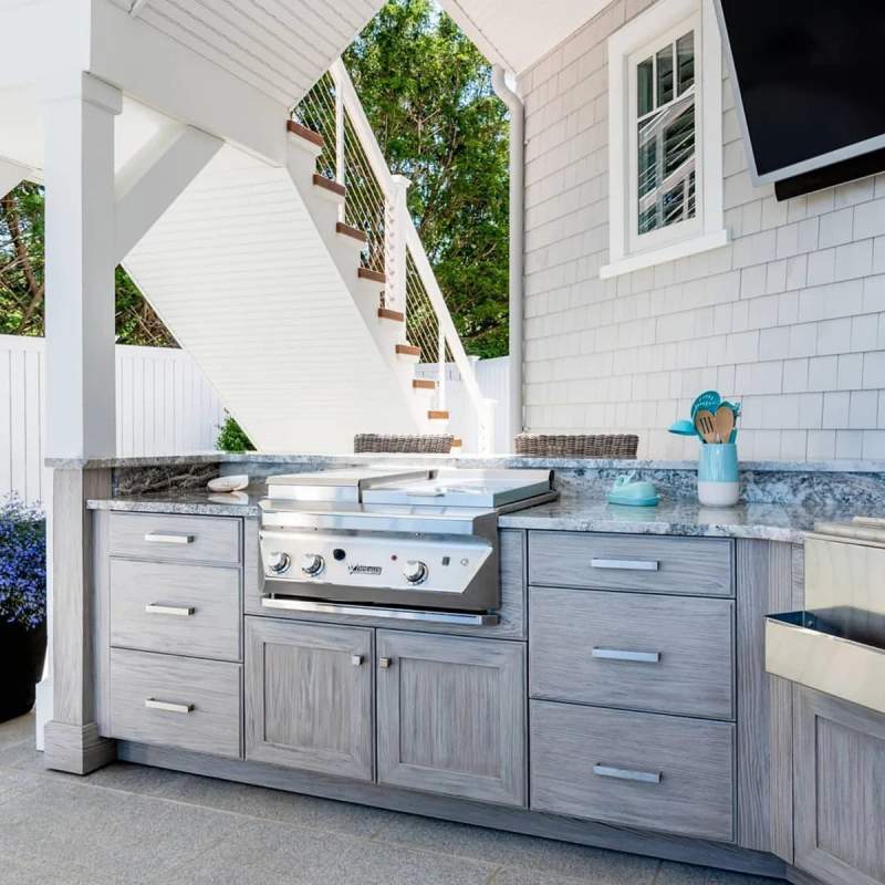 Gray outdoor kitchen with grill